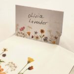 Whimsical table place setting card for Olivia Lavender.