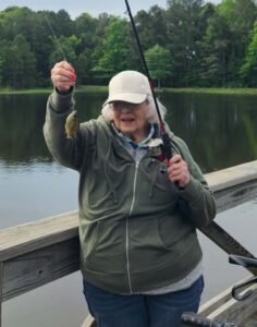 Resident enjoying independent living fishing derby.