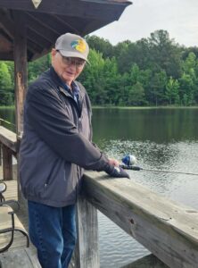 Resident enjoys independent living spring fishing derby at Good Shepherd Community.
