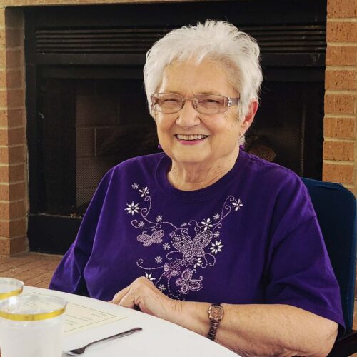 Senior woman smiling.