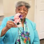 Senior woman wins Floral Tea Cup at Mothers' Day Tea Party